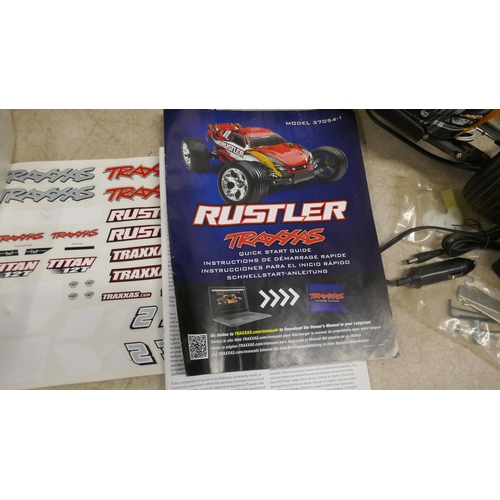 5059 - A Rustler Traxxas ready to race 35mph+ remote control car, in box