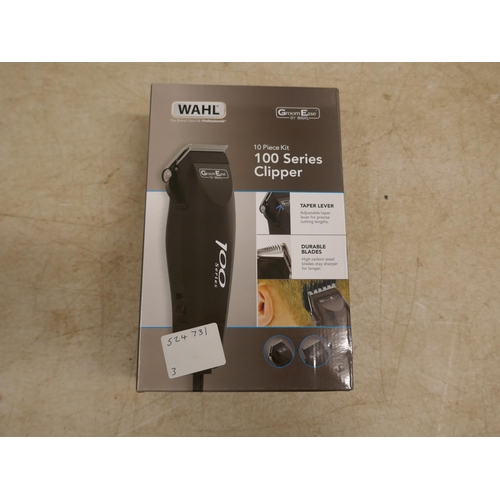 5063 - A Wahl Groom Ease 10 piece 100 series hair clipper and a Revamp Pro-gloss hot ceramic round brush