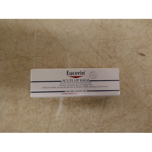 5073 - 7 packs of 12 Eucerin Acute lip balms, 10ml per lip balm (Expires 10/24) * This lot is subject to VA... 