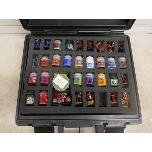 5074 - A quantity of Citadel miniature model paint and a quantity of miniature figures in a Citadel case