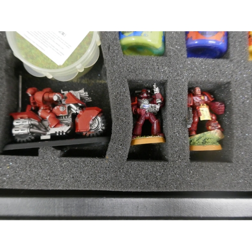 5074 - A quantity of Citadel miniature model paint and a quantity of miniature figures in a Citadel case