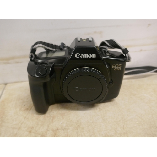 5075 - A Canon EO5 1000 film camera body, a Canon EO5 650 film camera body, a Canon EO5 650 with Canon zoom... 