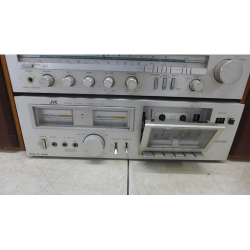 5094 - A quantity of stereo equipment including a Rotel RA-214 integrated stereo amplifier, a JVC R-1XL ste... 