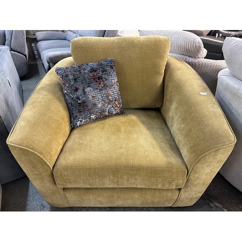 3207 - A turmeric upholstered armchair