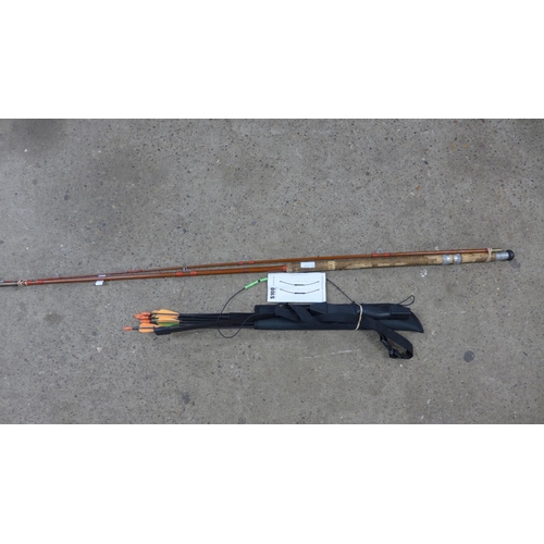 5178 - A Decathlon childrens bow and arrow with a vintage fishing rod