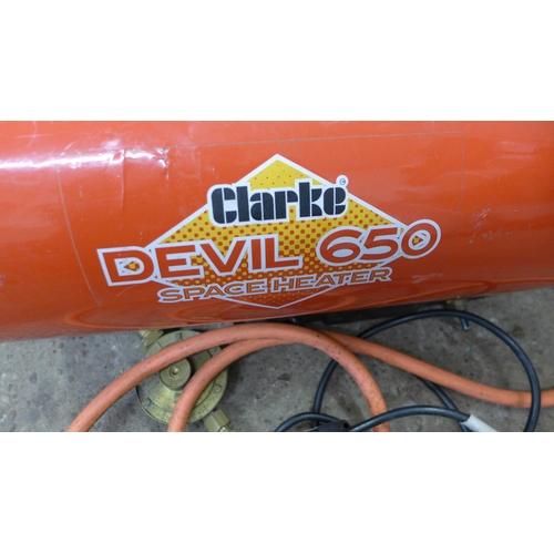 5182 - A Clarke 'Devil 650' space heater with a Calor Gas propane bottle