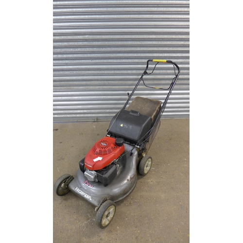 5187A - A Honda 12Y self propelled petrol lawn mower with a collector box  * Police repossession