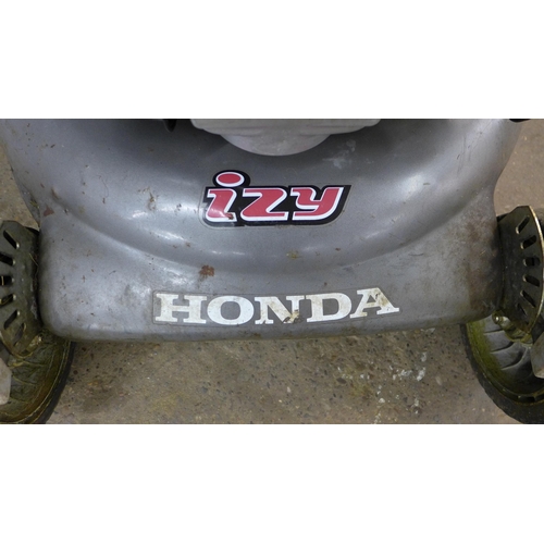 5187A - A Honda 12Y self propelled petrol lawn mower with a collector box  * Police repossession