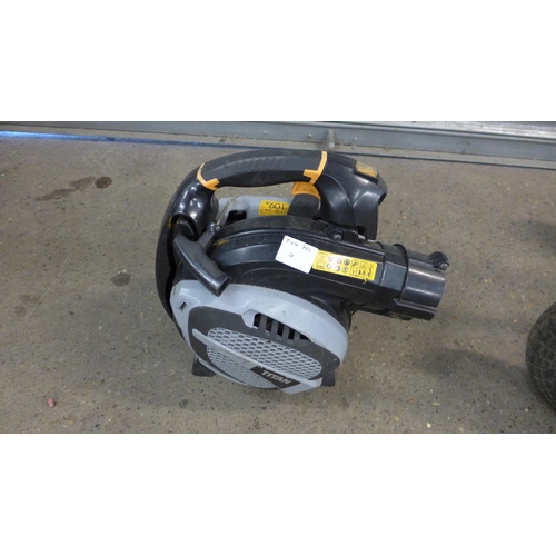 5192 - A Titan petrol blower/vacuum (No attachments) and a blue sack barrow