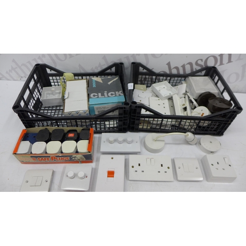 5211 - A box containing sockets, switches, junction boxes, plug tops, etc., 1 box of surface pattress boxes... 