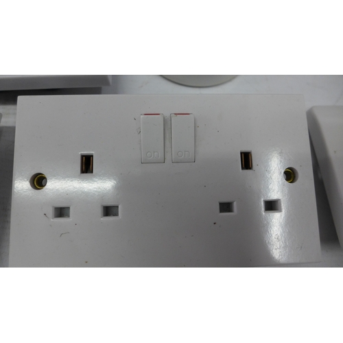 5211 - A box containing sockets, switches, junction boxes, plug tops, etc., 1 box of surface pattress boxes... 