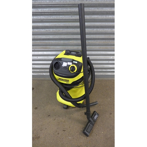 5221 - A Karcher WD5 electric wet and dry vac with hose and brush attachment