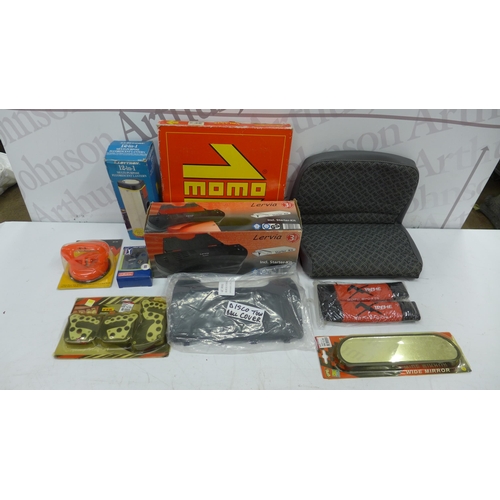 5244 - A box of assorted car accessories including MOMO steering wheel, Defender seat cover, heavy duty suc... 