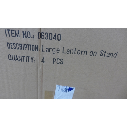 5254 - 4 large decorative metal garden lanterns on stands, boxed, unused