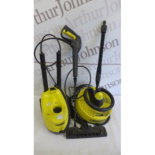 5275 - A Karcher SC3 steam cleaner with brush, lance and patio cleaner attachments