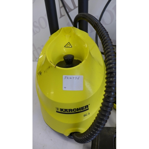 5275 - A Karcher SC3 steam cleaner with brush, lance and patio cleaner attachments