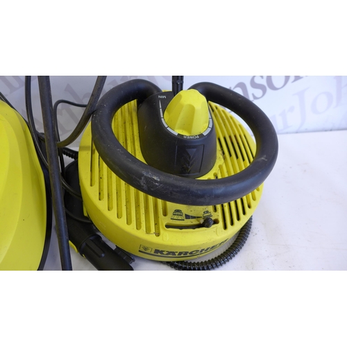 5275 - A Karcher SC3 steam cleaner with brush, lance and patio cleaner attachments