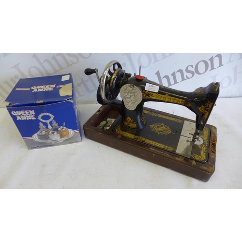 5284 - A Queen Ann revolving cruet tableware set and a Singer manual sewing machine