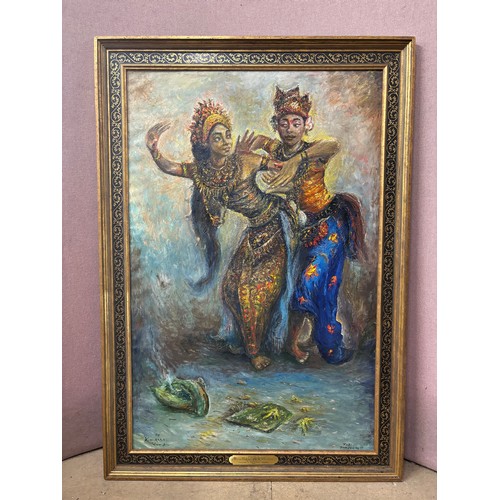 283 - K. Wivada ( Indonesian school), Oleg Balinese dancers, oil on canvas, bearing UN plaque, framed