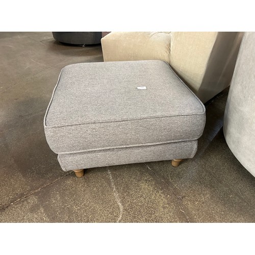 3216 - A light grey upholstered footstool