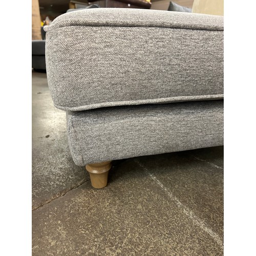 3216 - A light grey upholstered footstool