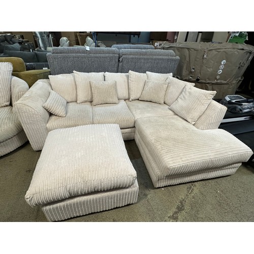 3218 - An ivory jumbo cord upholstered compact corner sofa and footstool