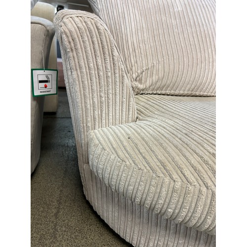 3219 - An ivory jumbo chord upholstered swivel chair