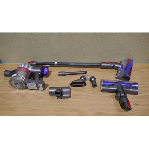 6117 - Dyson V8 Stick Vacuum Cleaner with accessories, no box, original RRP £264.99 *This lot is subject to... 