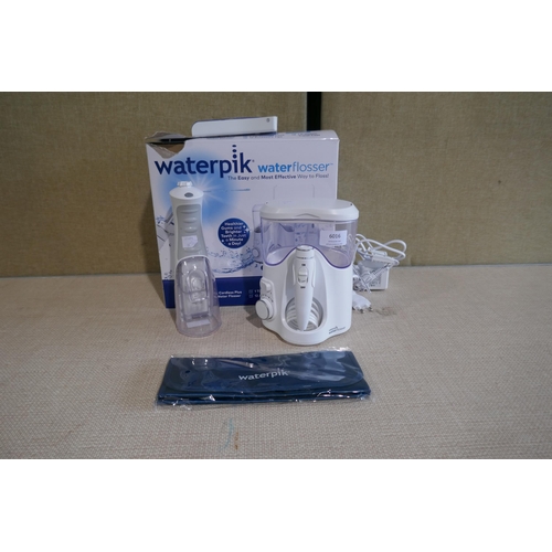 6016 - Waterpik Water Flosser with box and accessories   *This lot is subject to Vat