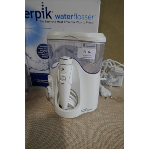 6016 - Waterpik Water Flosser with box and accessories   *This lot is subject to Vat