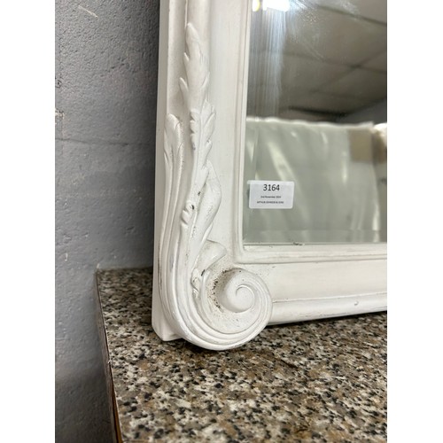 3164 - A large white painted overmantel mirror