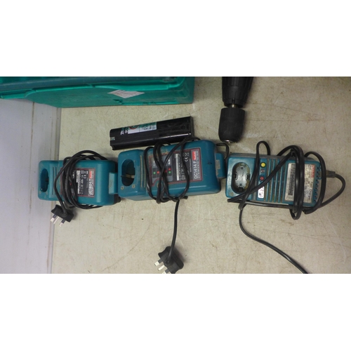 5040 - A quantity of Makita power tools including 5 drills 8390D, 6280D, 2 x 8480D, a quantity of batteries... 