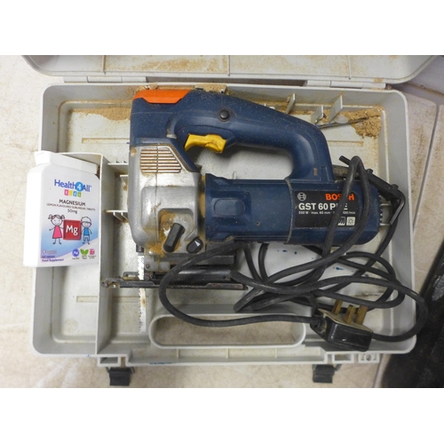 5044 - 2 cased power tools, a Bosch GST 60 PBE, 240V jigsaw and a Stihl saw power saw