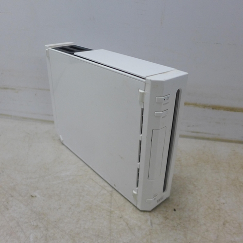 5069 - A boxed Nintendo Wii console with stand, sensor bar and AV component cables (missing power supply an... 