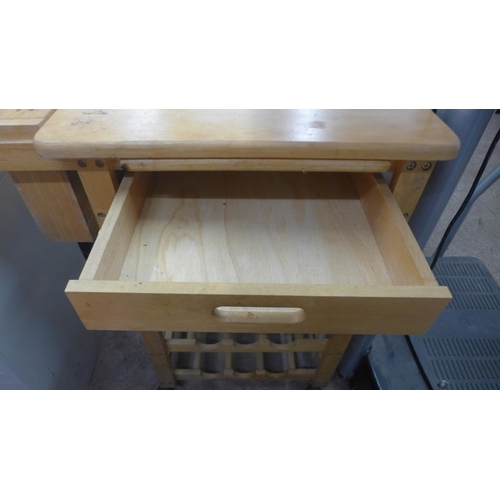 5196 - A kitchen chopping board trolley with knife block on wheels with drawer