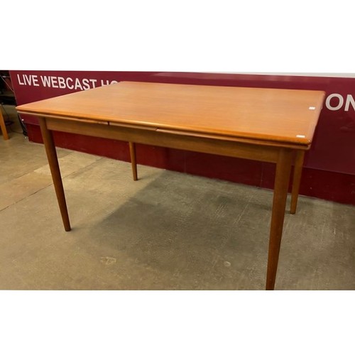 5 - A Danish teak draw-leaf dining table