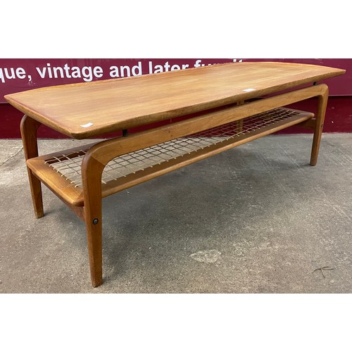 4 - A Danish Mogens Kold teak and rattan rectangular coffee table, designed by Arne Hovmand-Olsen