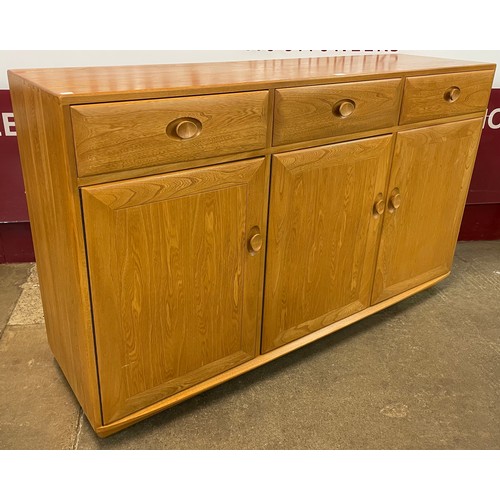 13 - An Ercol Blonde ash Windsor sideboard