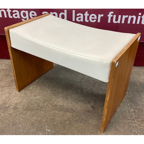 33 - A Stag Cantata teak dressing table, designed by John & Sylvia Reid and a teak stool