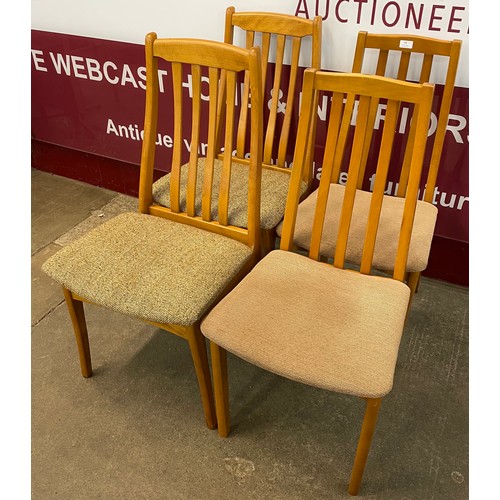 44 - Two pairs of teak dining chairs