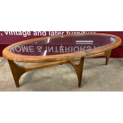 66 - A Stonehill Stateroom teak and glass topped oval coffee table