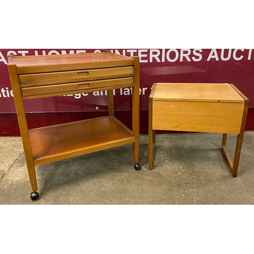 61 - A teak tea trolley, with nesting trays and a teak sewing box