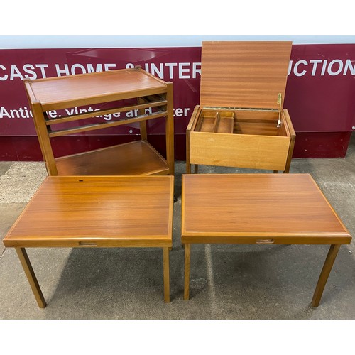 61 - A teak tea trolley, with nesting trays and a teak sewing box