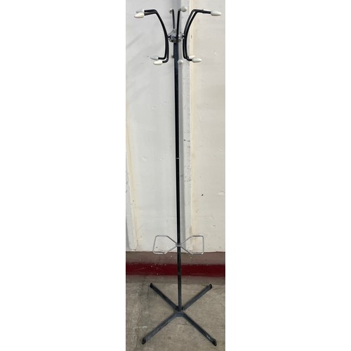 76 - A black tubular metal atomic hat and coat stand