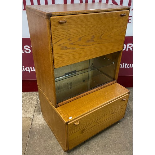 81 - A Stag oak and ash cocktail cabinet