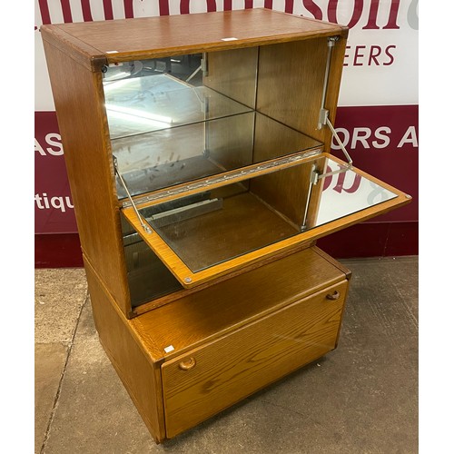 81 - A Stag oak and ash cocktail cabinet