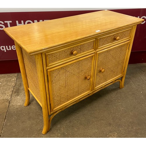 82 - An Italian bamboo and rattan sideboard