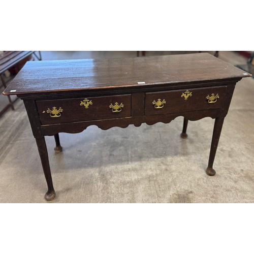 134 - A George II oak two drawer dresser