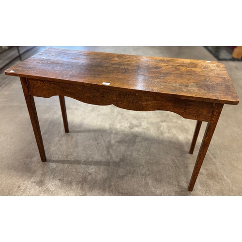 135 - A George III style oak serving table