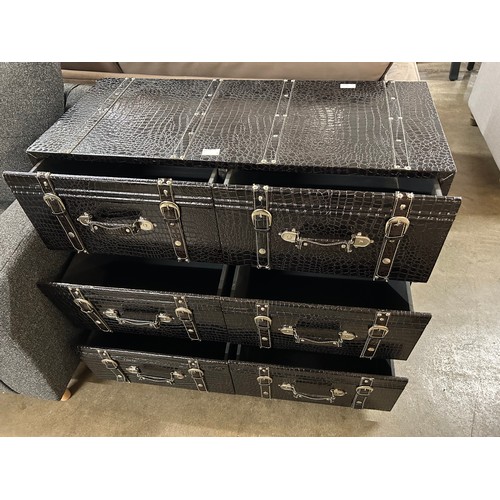 3035 - A black crocodile effect six drawer chest on castors